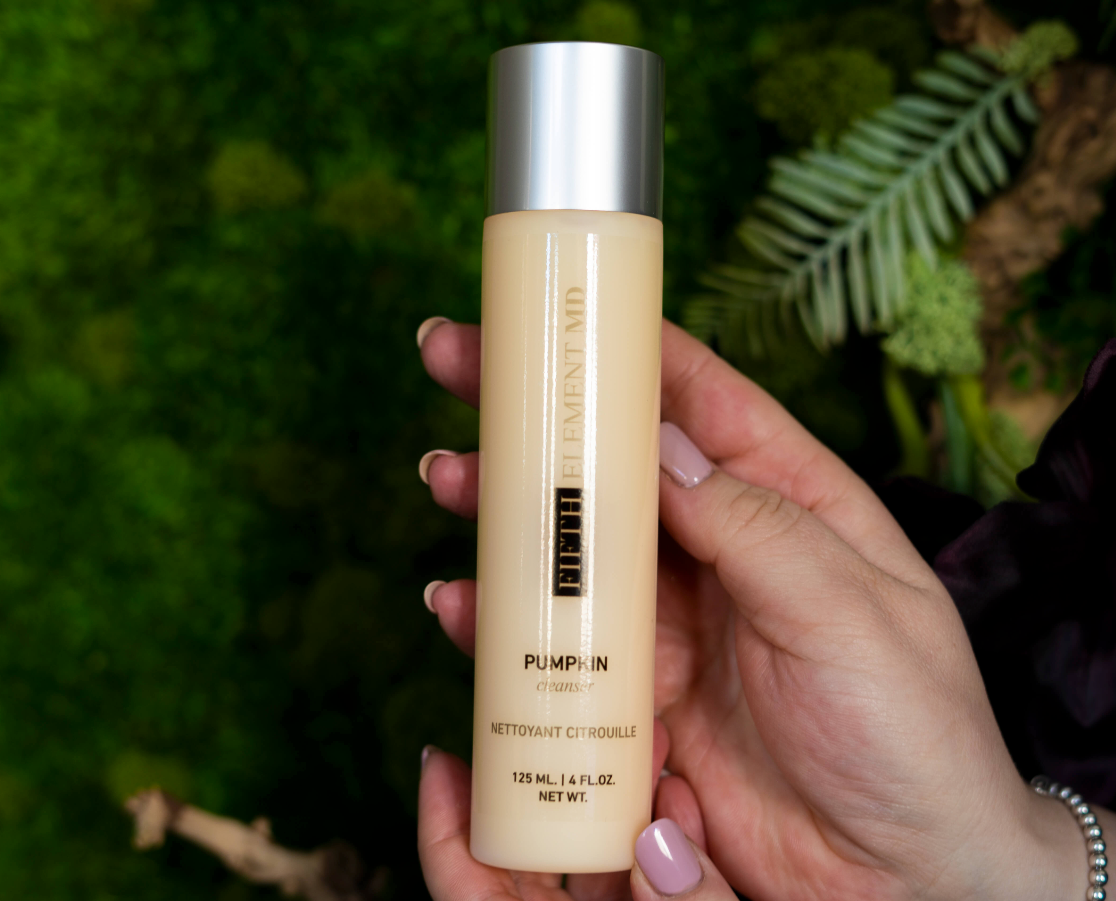 Pumpkin Cleanser with plants behind